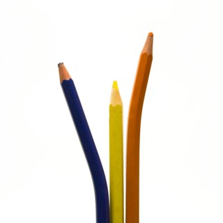 Colored pencils on white background