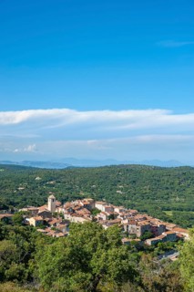 Landscape with the mountain village Ramatuelle and the Massif de l'Esterel in the background