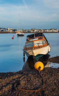Long time exposure of boats in low tide