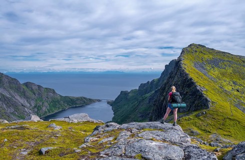 Hiker looks out over the Djupfjords