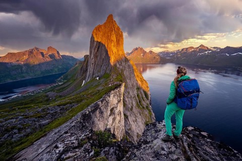 Hiker looks at landscape