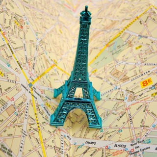Eiffel Tower on city map of Paris