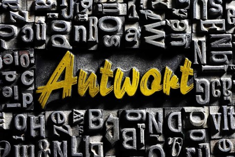 Old lead letters with golden writing