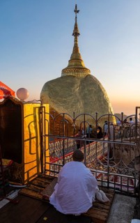 Monk praying at the Kyaiktiyo Pagoda