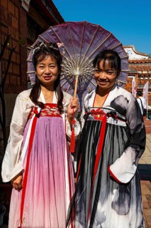 Local dressed women in the traditional Minnan-style houses