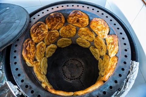 Traditional oven with bread