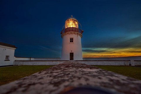 St. John`s Point lighthouse at dusk