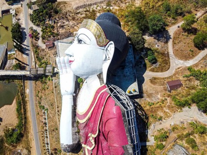 Aerial of a giant reclining buddha in Win Sein Taw Ya outside Mawlamyine