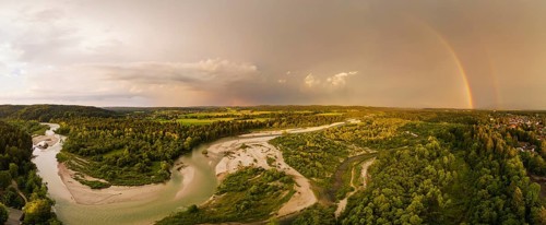 Isar in evening light with rainbow
