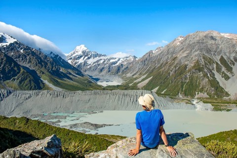 Hiker sitting on a rock