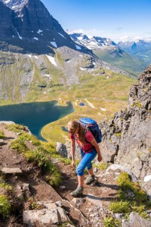 Hiking on a steep trail to Innerdalstarnet