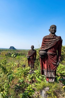 Huge line of monk statues in Win Sein Taw Ya outside Mawlamyine