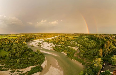 Isar in evening light with rainbow