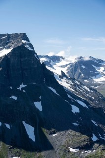 Snow covered mountain slope of Skarfjell mountain and Hesten