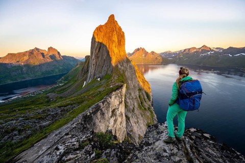 Hiker looks at landscape