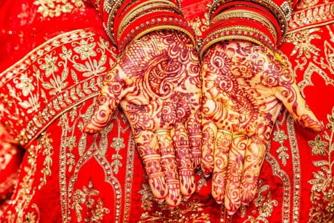 Close up of mehendi on bride's hand