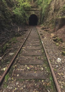 Rail bed with tunnel portal
