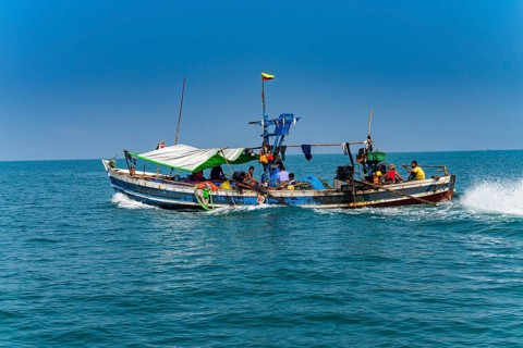 Sea gypsies Moken on their fishing boat