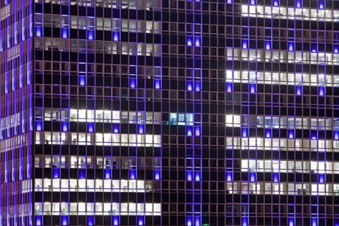 Illuminated Magna Tower in the evening