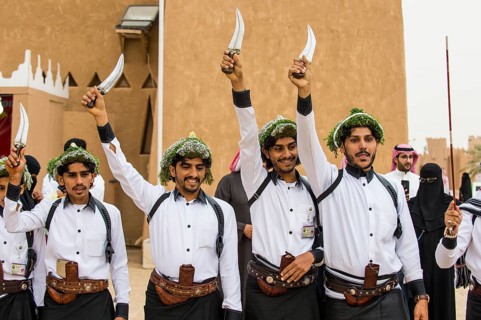 Colourful dressed traditional men