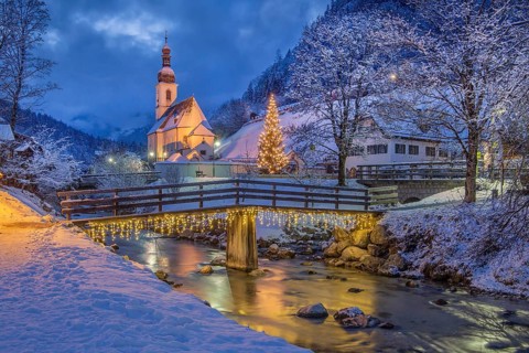 Painter's corner with Ramsauer Ache and parish church with Christmas fir tree
