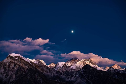 View in the moonlight from Renjo La Pass 5417 m to the east on Himalaya with Mount Everest