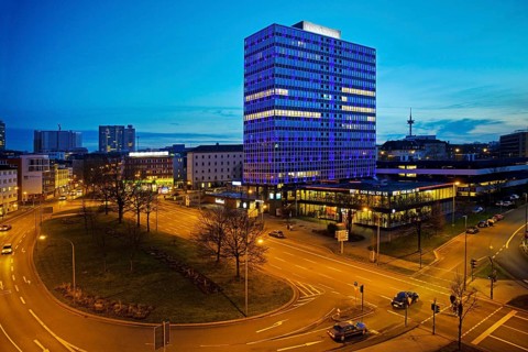 Illuminated Magna Tower in the evening