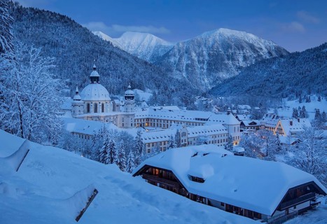 View of the village with the monastery at dusk