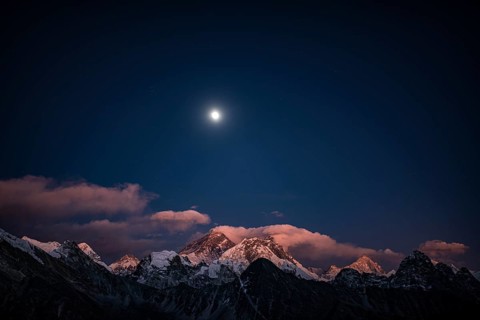 View in the moonlight from Renjo La Pass 5417 m to the east on Himalaya with Mount Everest