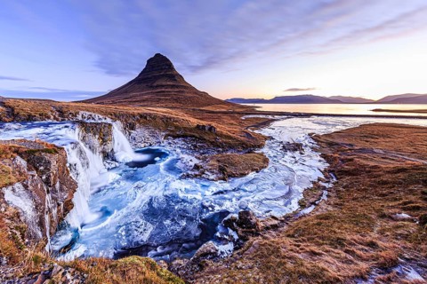 Morning atmosphere at Kirkjufell with waterfall Kirkjufellsfoss