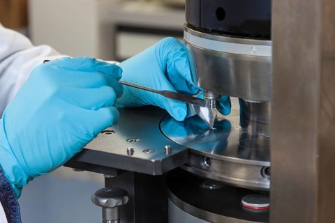 Scientists during their research work on a tablet press at the Institute for Pharmaceutical Technology and Biopharmacy at Heinrich-Heine-University Duesseldorf