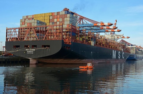 Container ships and mooring boat