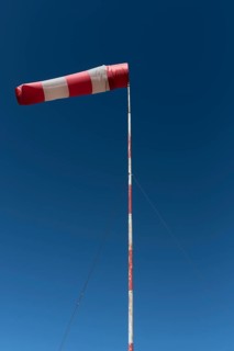 Inflated windsock in blue sky