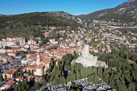 Aerial view La Turbie above Monaco with Roman victory monument Tropaeum Alpium or Trophee des Alpes in honour of Emperor Augustus and church