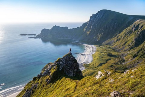 Hiker standing at the precipice
