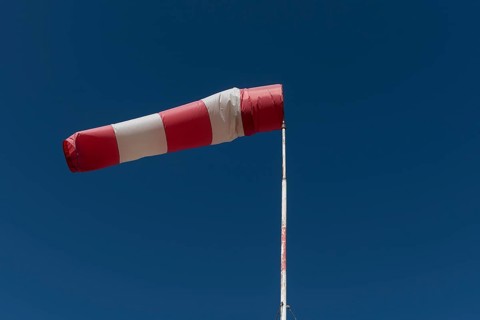 Inflated windsock in blue sky