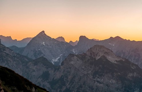 Sunset behind mountain silhouette