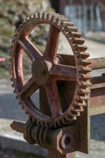 Rusty gear wheel of a weir