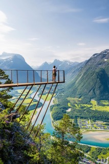 Hikers standing on viewing platform Rampestreken