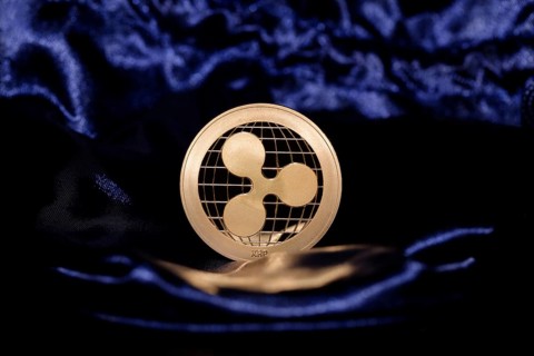 An XRP Ripple on blue velvet