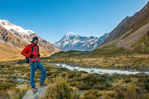 Hiker standing on a rock