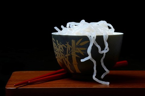 Shirataki noodles made from konjac flour in a bowl with chopsticks