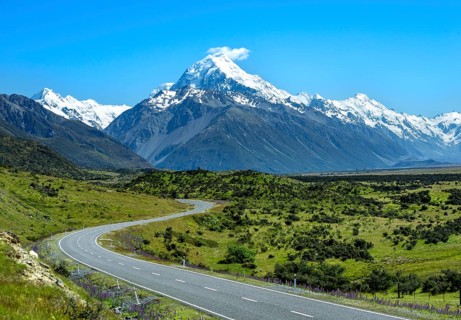 Country road overlooking snow-capped Mount Cook National Park