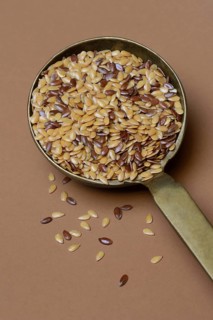 Yellow and brown linseed in trowel