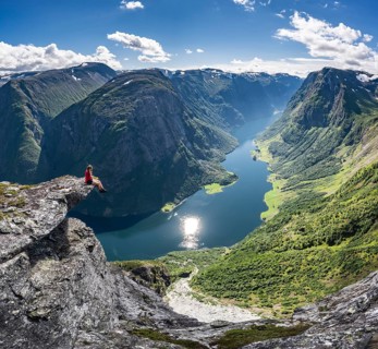 Hiker sitting on rock