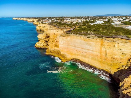 Wooden pathway called Algar Seco Cliff Walk on the coast of Carvoeiro