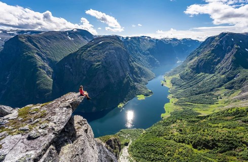 Hiker sitting on rock