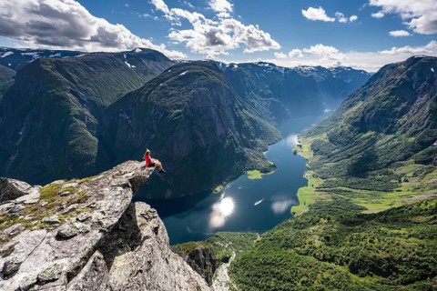 Hiker sitting on rock