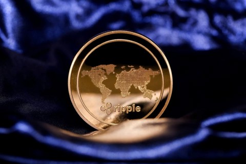 An XRP Ripple on blue velvet