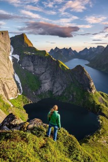 Young hiker enjoying view from Reinebringen